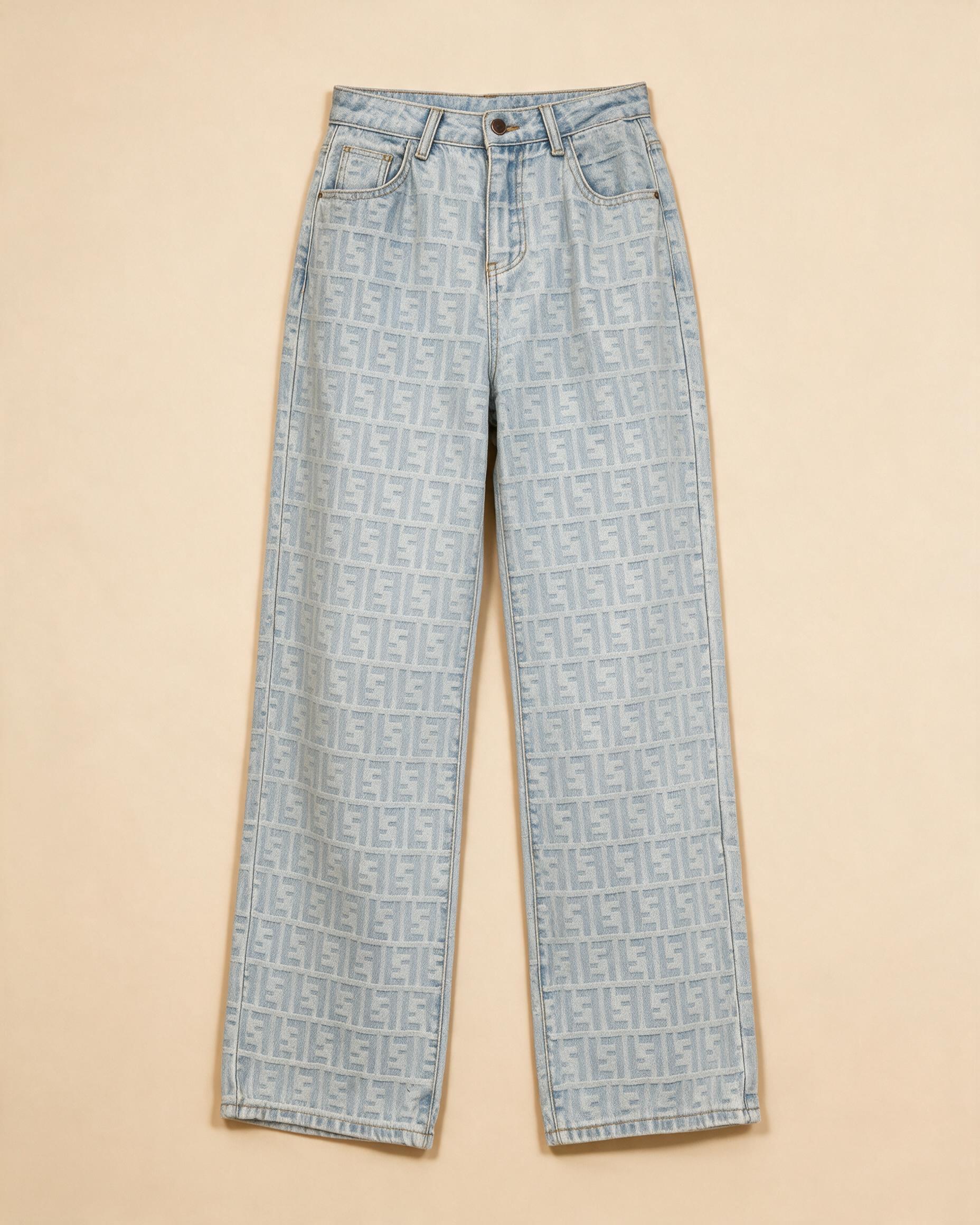 Jeans usati lavaggio chiaro con motivo monogramma all-over