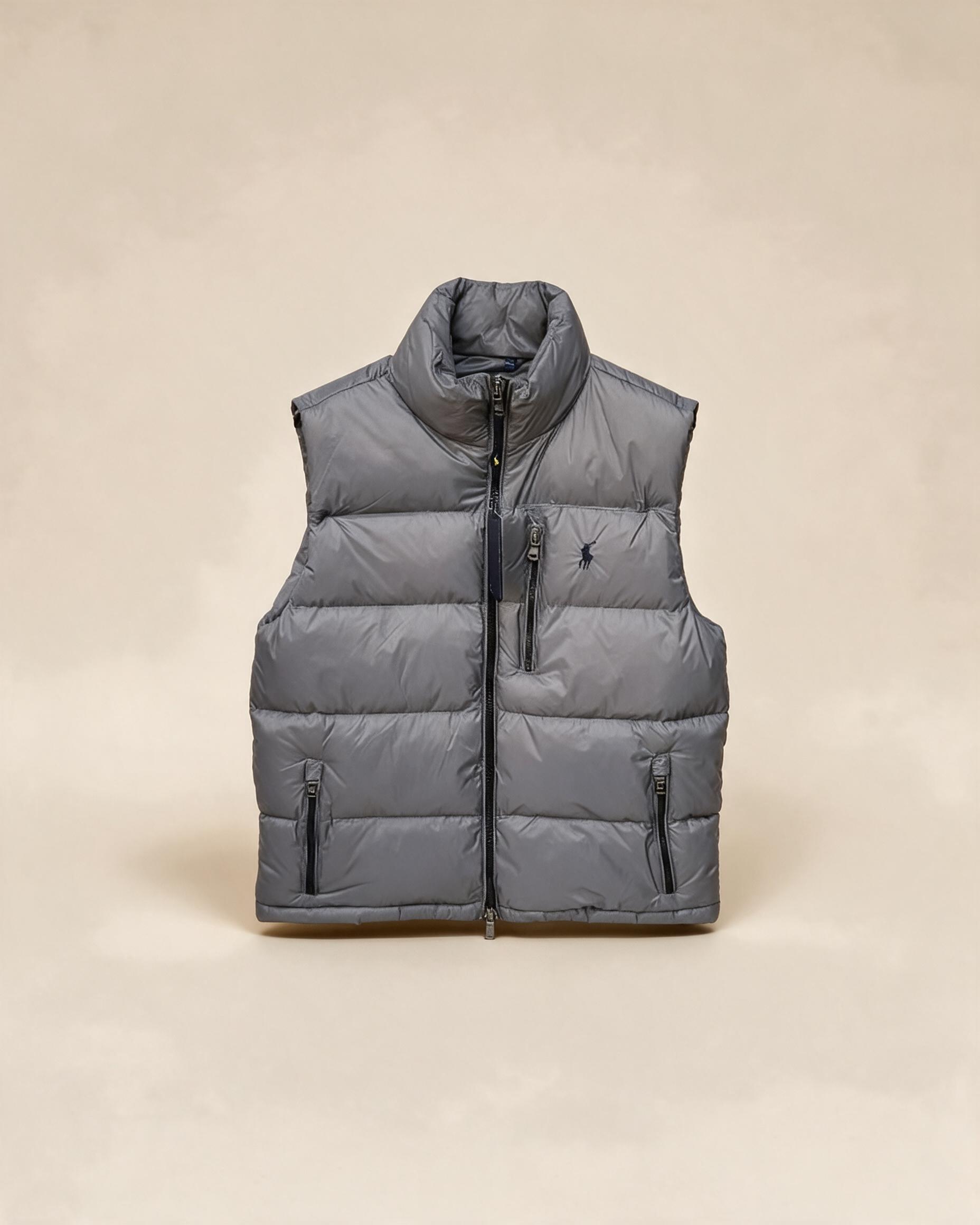 Gilet smanicato imbottito grigio con zip e tasche