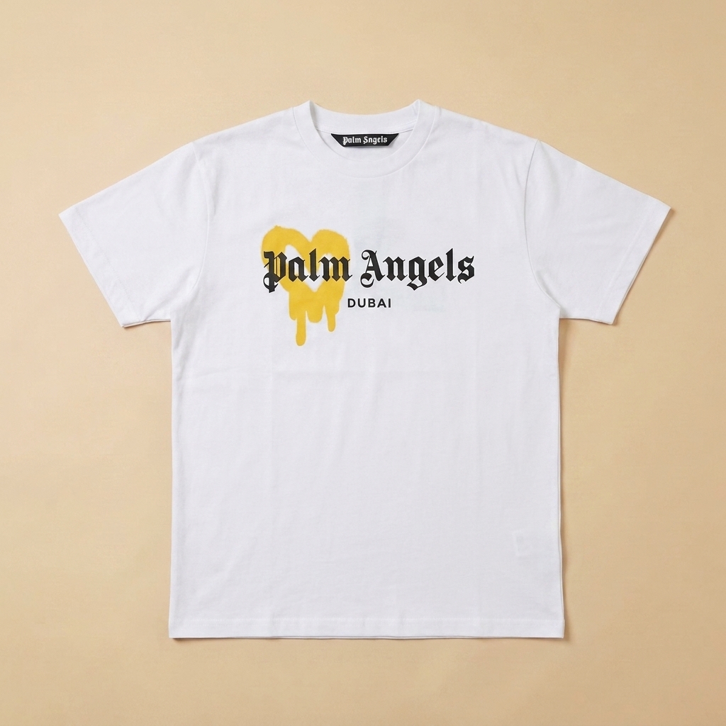 T-shirt usata bianca con logo Dubai e cuore giallo